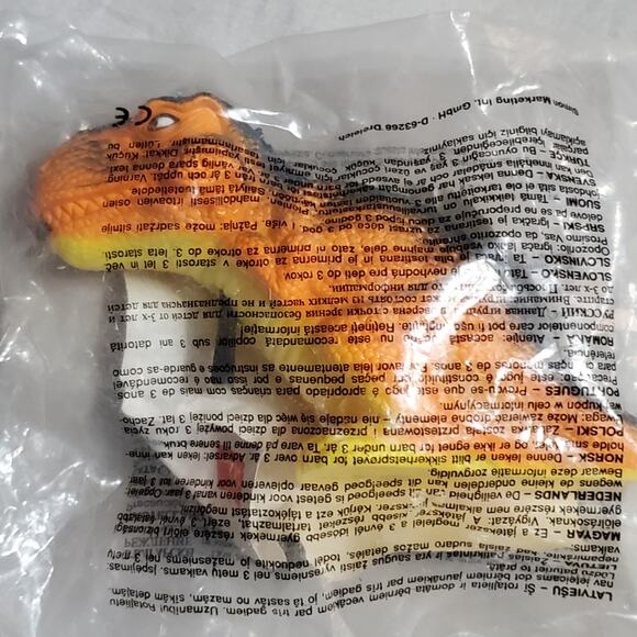 1997 McDonalds United Kingdom Dinosaur Water Squirter New in Package - Picture 1 of 2